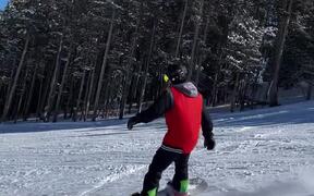 Snowboarder Trying to 50/50 Taco's Around Rail