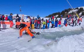 Downhill Skiers Glide on Water - Sports - VIDEOTIME.COM
