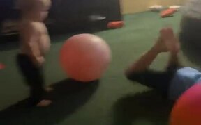 Kid Lands Headfirst on Toy Ball - Kids - VIDEOTIME.COM
