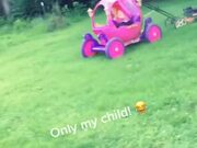 Kid Mows Lawn With Toy Car