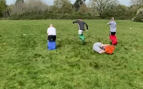 Adults Fumbling All Over While Playing Sack Race
