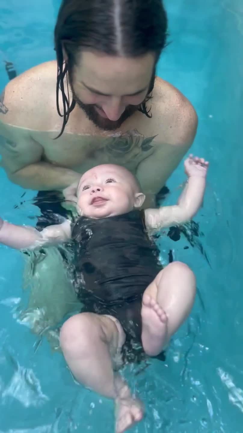 An Infant Learning To Stay Afloat