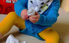 A Baby Struggles BIG TIME With Putting A Sock On  - Kids - VIDEOTIME.COM