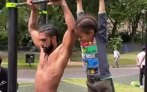 Strength & Conditioning Educator And Kid Hold Bar - Sports - VIDEOTIME.COM