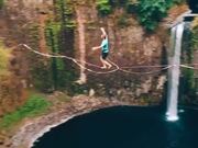Guy Goes Slacklining Between Two Cliffs in Forest