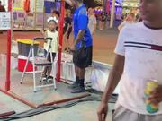 Kid Wins Monkey Bar Game At State Fair