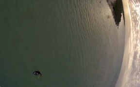 Person Makes Compilation of Brother Kite Surfing