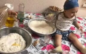 Kid Plays With Flour While Baking Cake With Mom - Kids - VIDEOTIME.COM