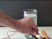 Science Teacher Shows Electrolysis Experiment