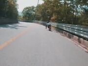 Person Does Downhill Long Boarding