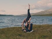 Acroyoga Duo Performed Advanced Flow by a Lakeside
