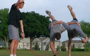 Friends Perform Tricks While Doing Double Dutch