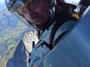 Wingsuit Pilot Glides Down Scenic Ridge