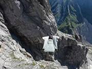 Wingsuit Pilot Glides Down Scenic Ridge