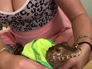 Owner Dresses Caiman in Cute Frog Outfit