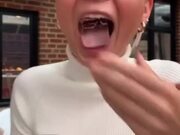 Woman Gets Ice Cube Stuck in Her Mouth