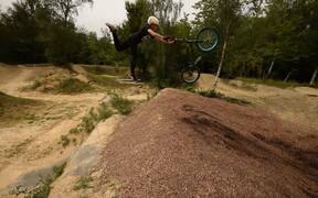 Guy Attempting Tailwhip on BMX Falls