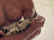 Kitten Falls Asleep in Owner's Arms