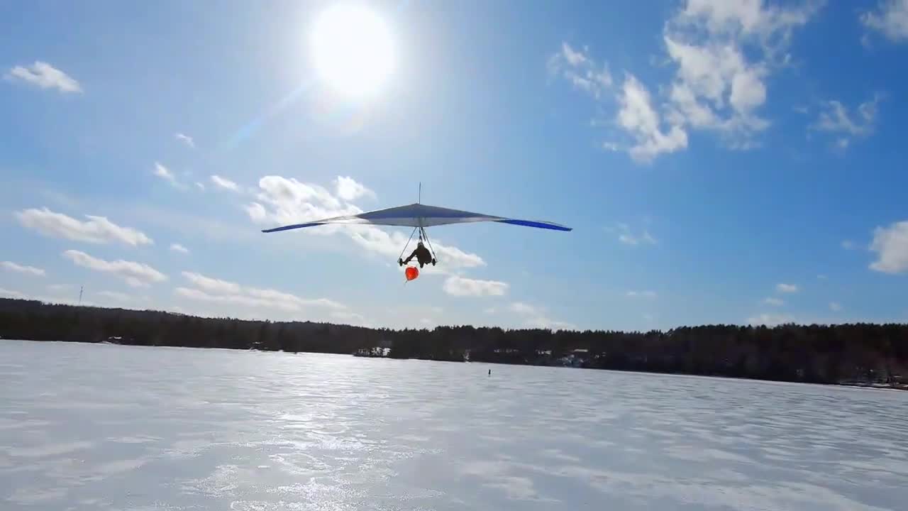 Drone Captures Person Flying Hang Glider