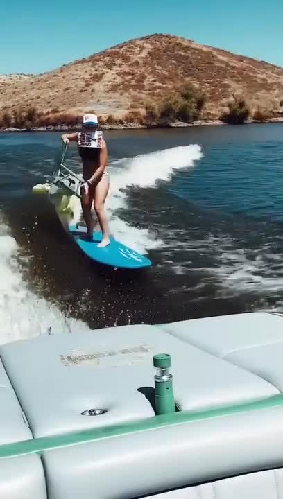 Girl Sits on Chair While Surfing