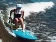 Girl Sits on Chair While Surfing