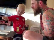 Toddler Grabs Fork and Feeds Dad Eggs