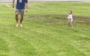 Dad and Toddler Dances Together in Rain - Kids - VIDEOTIME.COM