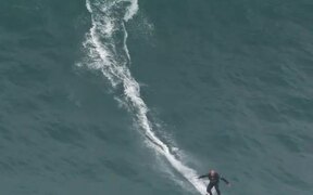 Person Rides Surfboard On High Tides - Sports - VIDEOTIME.COM