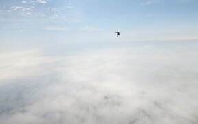 Person Enjoys Free Fall While Skydiving