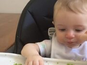 Baby Girl Makes Silly Faces as She Tastes Broccoli