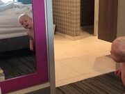Baby Girl Sees Reflection for the First Time