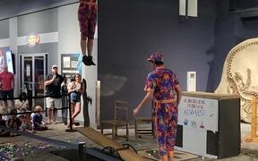 Duo Perform Acrobatic Tricks on See-Saw