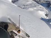 Guy Skis Down Steep Mountain Side at Speed