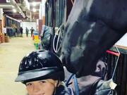 Horse Affectionately Licks Little Girl's Helmet