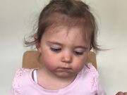 Little Girl Struggles With Not Eating Chocolates