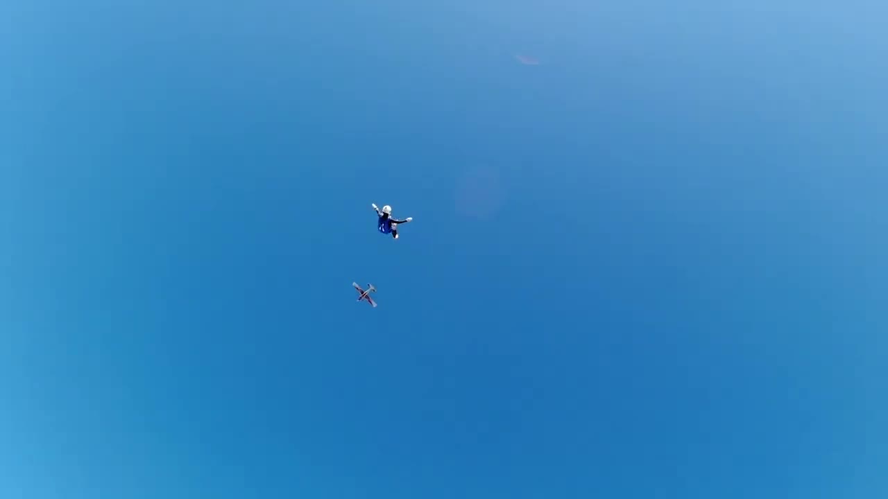 Skydiver Performs Different Poses in Sky