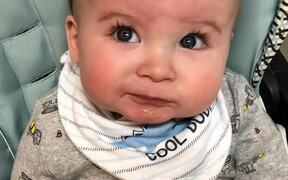 Little Baby Makes Funny Faces as He Tries New Food