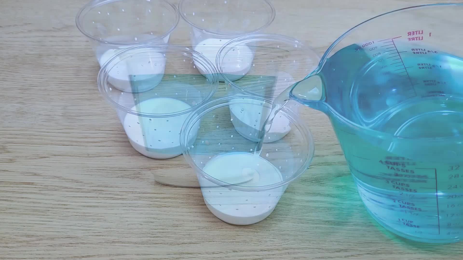 Person Creatively Makes Snowman Jelly Cups