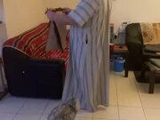Cat Thinks It's Playtime and Jumps on Prayer Mat