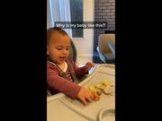 Energetic Toddler Throws Food on Table
