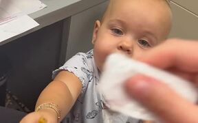Toddler Licks Ketchup Off of Fries Repeatedly
