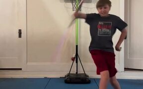 Guy Performs Basketball Trickshot With Bo Staff - Kids - VIDEOTIME.COM
