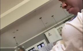 Dog Leans Head on Pregnant Owner's Belly