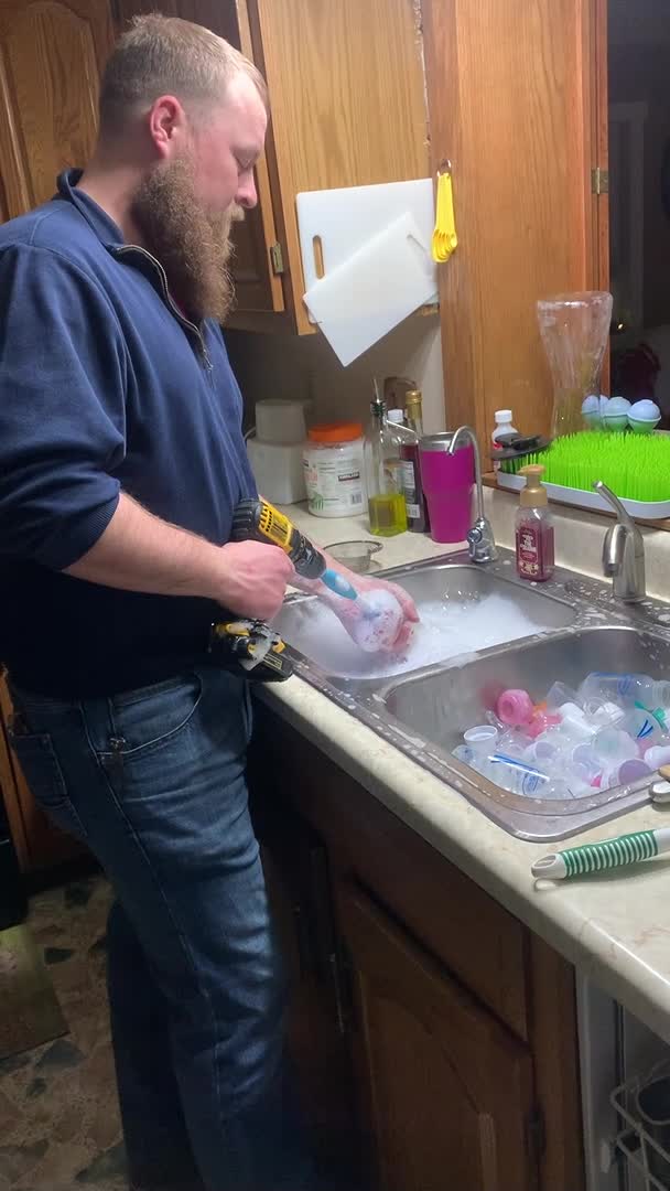 Man Uses Power Drill to Clean Baby Feeding Bottles