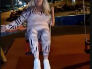 Woman Slips From Kids' Swing