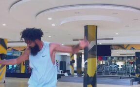 Guy Does Freestyle Football Tricks With Ball