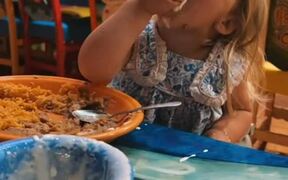 Kid Scoops up Cheese Dip in Her Mouth - Kids - VIDEOTIME.COM