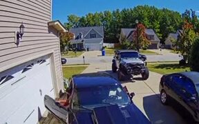 Car Door Damages Garage Door