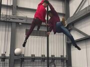 2 Friends Perform Impressive Stunt on Chinese Pole