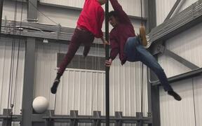 2 Friends Perform Impressive Stunt on Chinese Pole
